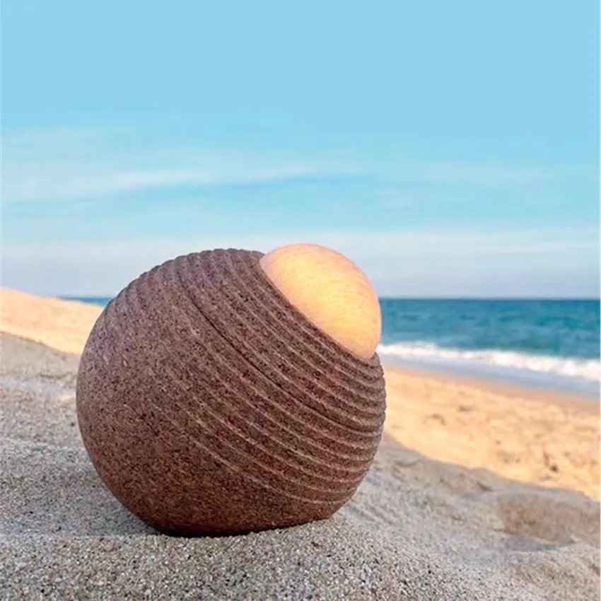 Terra, la llum de taula que fusiona la màgia de la natura amb la innovació tecnològica.