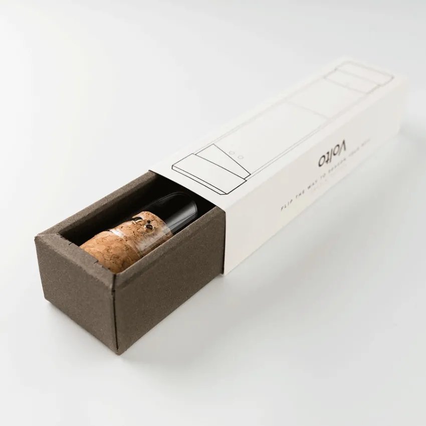 Salière/poivrière Volto à l'intérieur de la boîte