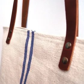 Sac rustique à rayures bleues et poignées en cuir