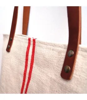 Rustic bag with red stripes and leather handles